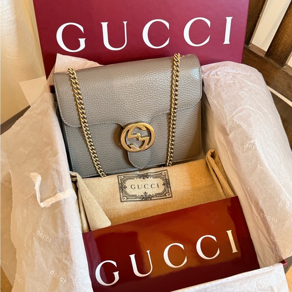 Gucci Handbags - Gucci gray Leather Crossbody Bag with Gold Accent